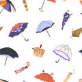 Repeatable pattern of different umbrellas. Endless background of various parasols, brollies, and canopy from rain. Design with Royalty Free Stock Photo