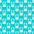 Repeated faces of cute rabbits. Seamless pattern for children.