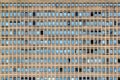 Repeated pattern of a high buidling facade with windows