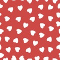 Repeated white hearts on a red background. Cute seamless pattern. Endless romantic print. Vector illustration.