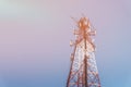 Repeater tele communication tower with blue sky on background. Toned image with Royalty Free Stock Photo