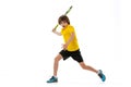 Dynamic portrait of teen, sportive kid playing tennis isolated over white studio background. Concept of sport Royalty Free Stock Photo