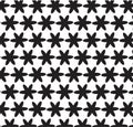 Repeating black star-like shapes arranged in a grid pattern Royalty Free Stock Photo