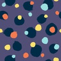 Repeating coloured round spots painted with rough brush. Seamless pattern with irregular watercolour polka dot.