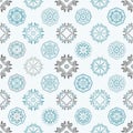 Repeating pattern of geometric snowflakes in varying designs Royalty Free Stock Photo