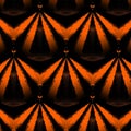 minimal repeating design in bright orange on dark background