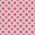 Repeating pattern of pink and blue donuts on a pink background. Flat lay Royalty Free Stock Photo