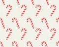 Repeating Pattern of Red and White Striped Candy Canes on Light Background image photo Royalty Free Stock Photo