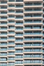 Repeating pattern of windows and balcony. Bulding front Royalty Free Stock Photo