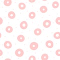 Repeating pink circles and round dots on white background. Cute geometric seamless pattern drawn by hand.