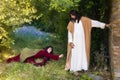 Touching Jesus robe Royalty Free Stock Photo