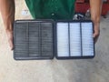 Replacement air filter. Technician is changing new air filter.cabin air conditioner filter of car Royalty Free Stock Photo