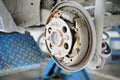 Replacement of car brake pads in garage. Worn brake pads ,selective focus