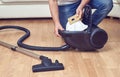 Replacement of a dust bag in vacuum cleaner Royalty Free Stock Photo