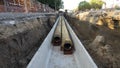 Replacement pipes in the city.Construction of heating mains for municipal infrastructure.