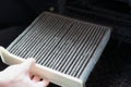 Replacing the ar cabin filter the car. Replacing Dirty Air filter Royalty Free Stock Photo