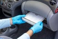 Replacing cabin pollen air filter for a car Royalty Free Stock Photo