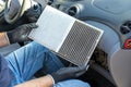 Replacing cabin pollen air filter for a car Royalty Free Stock Photo