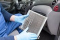 Replacing dirty cabin pollen air filter for a car