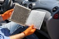 Replacing the dirty cabin pollen air filter for a car Royalty Free Stock Photo