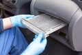 Replacing dirty cabin pollen air filter for a car Royalty Free Stock Photo