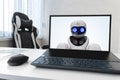 Replacing a person with artificial intelligence. laptop with a robot on the screen. dismissal of employees and replacement by