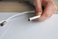 Replacing and repairing a coaxial cable, TV cable connector. Royalty Free Stock Photo