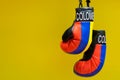 Replica boxing gloves with Columbia label and Country colors.