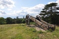 Replica cannon on the earthworks at Basing House with the buildings of Basingstoke in the distance Royalty Free Stock Photo