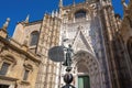 Replica of El Giraldillo Statue - Weather vane on top of Cathedral Tower and Door of the Prince - Seville, Spain Royalty Free Stock Photo