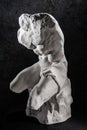 Gypsum copy of Belvedere Torso statue for artists. Replica of famous ancient Greek fragmentary marble sculpture of a