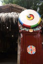 Replica of Korean traditional drum in front of a house in theme park