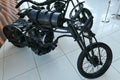 Replica of motorbikes from postapocalyptic movie Mad Max - Fury Road, made of junkyard scrap parts