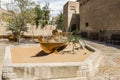 Replica of old Arabic fishing wooden boat is located in reconstructed old part of the Dubai city - Al-Bastakiya quarter in the