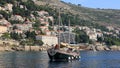 Replica of the old-time fishing boat underway off the Dalmatian Coast, Dubrovnik, Croatia Royalty Free Stock Photo