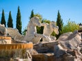 Replica of the Trevi Fountain in the Europa Park of Torrejon de Ardoz with a beautiful blue sky with clouds in the background