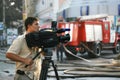 The reporter reports on the fire in the building from the scene Royalty Free Stock Photo