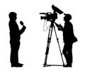 Reporter shooting cameraman silhouette Royalty Free Stock Photo