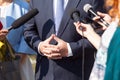 Reporters making press interview with politician or business person Royalty Free Stock Photo