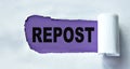 REPOST - word on a purple background and torn white paper