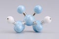 Chemical model of a water molecule demonstrating molecular structure and hydrogen bonds in a science laboratory setting Royalty Free Stock Photo