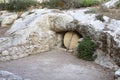 A reproduction 1st century jewish Garden Tomb with stone door in Israel