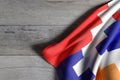 Republic of Artsakh flag over a wooden surface