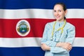 Republic of Costa Rica healthcare concept with doctor on background. Medical insurance, work or study in the country