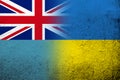 The Republic of Fiji National flag with National flag of Ukraine. Grunge background