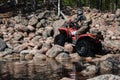 REPUBLIC OF KARELIA, RUSSIA - CIRCA JUNE, 2022: Off-road tournament Ladoga Trophy 2022 in Karelia. ATV racer rides on Royalty Free Stock Photo