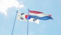 Republic of Korea and Netherlands, two flags waving against blue sky Royalty Free Stock Photo