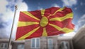 Republic of Macedonia Flag 3D Rendering on Blue Sky Building Background Royalty Free Stock Photo