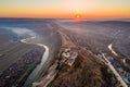 Republic of Moldova Old Orhei Monastery and Butuceni Village aerial view at sunrise Royalty Free Stock Photo