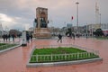 The Republic Monument at Taksim Square, Beyoglu district, Istanbul, Turkey on cloudy evening to commemorate the republic formation
